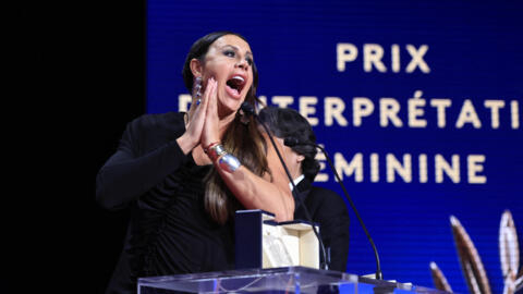 Spanish actress Karla Sofia Gascon reacts on stage after she and the rest of the female cast was awarded with the Best Actress Prize for their part in the film "Emilia Perez" during the Closing Ceremony at the 77th edition of the Cannes Film Festival in Cannes, southern France, on 25 May, 2024.