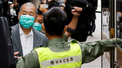 Media mogul Jimmy Lai, founder of Apple Daily, leaves the Court of Final Appeal by prison van in Hong Kong, China February 9, 2021. REUTERS/Tyrone Siu/File Photo