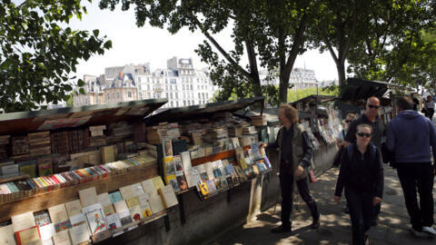 "Bouquinistes" in Paris sell used and antique books along the River Seine. 