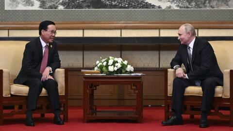 Russian President Vladimir Putin, right, listens to Vietnam's President Vo Van Thuong during their meeting on the sidelines of the Belt and Road Forum in Beijing, China, on Tuesday, Oct. 17, 2023. (Gr