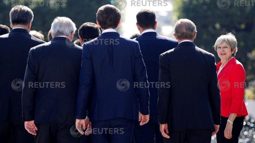 Britain's Prime Minister Theresa May arrives for a family photo during the European Union leaders informal summit in Salzburg, Austria, September 20, 2018.