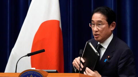 Japan's Prime Minister Fumio Kishida holds a file at the end of a press conference at the prime minister's office in Tokyo, Japan, June 21, 2024.