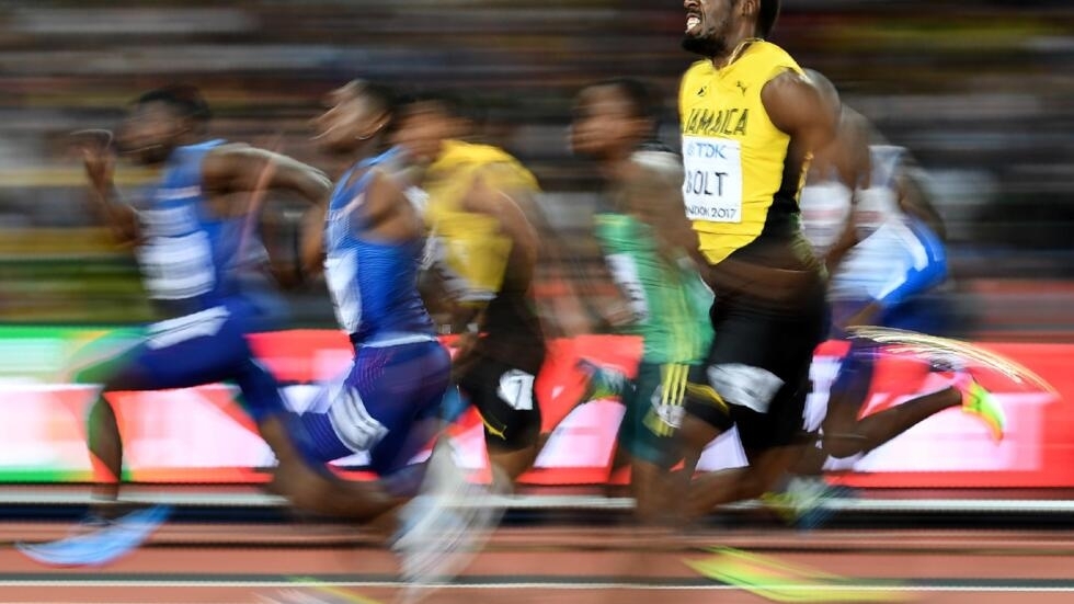 Usain Bolt y otros atletas durante la final de los 100 metros del Mundial de Londres, 5 de agosto 2017.