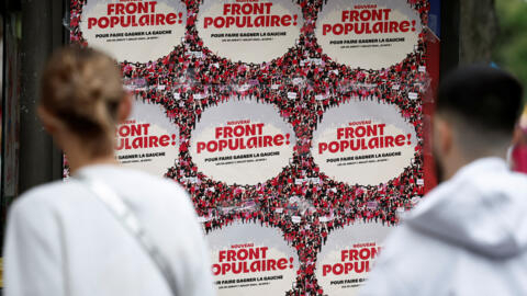 Posters for the New Popular Front at a rally against the far right in Paris on 15 June 2024, ahead of early parliamentary elections.