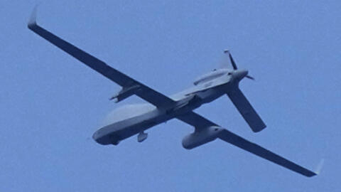 An unidentified drone flies over the areas of Second Thomas Shoal, locally known as Ayungin Shoal, at the disputed South China Sea while Chinese coast guard ships tries to block Philippine coast guard