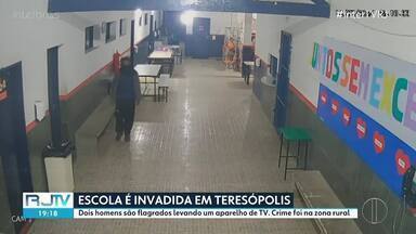 Escola é invadida em Teresópolis - Câmera de segurança flagra dois homem levando um aparelho de televisão em Vieira, zona rural da cidade.