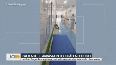 Paciente é filmado se arrastando por corredor de hospital em Goiânia - Mulher flagrou homem se arrastando sem receber ajuda de atendentes.