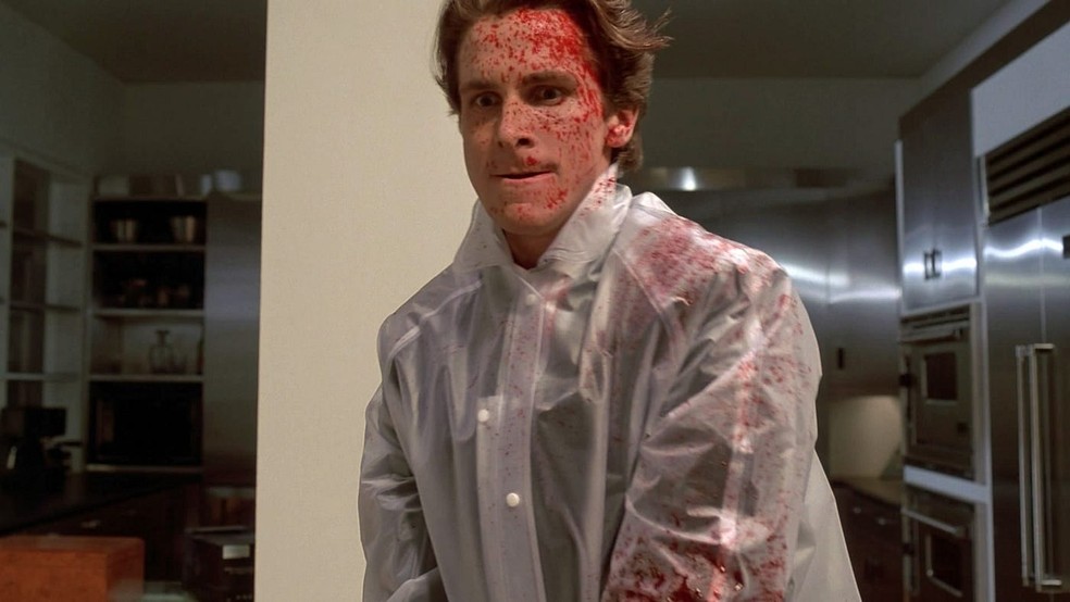 Christian Bale como Patrick Bateman em 'Psicopata Americano' (2000). — Foto: Reprodução | Lionsgate