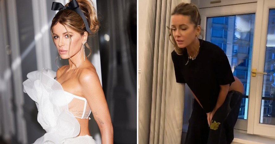 Kate Beckinsale mostra o bumbum na janela