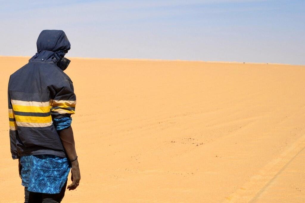 Un migrant dans le désert au nord du Niger, le 22 janvier 2019. Crédit : AFP