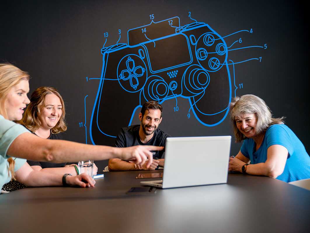 Company staff around a conference table discussing a project at Sony headquarters