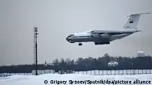 6737994 09.01.2022 An Ilyushin Il-76MD military transport aircraft is seen at Almaty airport before performing an evacuation flight, Kazakhstan. On Saturday, the Russian embassy in Kazakhstan announced that military transport aircraft of the Russian Defence Ministry would perform evacuation flights from Almaty to Ivanovo and Orenburg on January 9. Grigory Sysoev / Sputnik