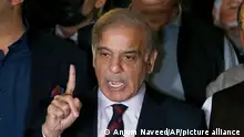 Pakistan's opposition leader Shahbaz Sharif speaks during a press conference after the Supreme Court decision, in Islamabad, Pakistan, Thursday, April 7, 2022. Pakistan's Supreme Court on Thursday blocked Prime Minister Imran Khan's bid to stay in power, ruling that his move to dissolve Parliament and call early elections was illegal. That set the stage for a no-confidence vote by opposition lawmakers, who say they have enough support to oust him. (AP Photo/Anjum Naveed)