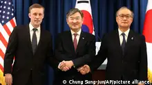 South Korea's National Security Adviser Cho Tae-yong, center, shakes hands with U.S. National Security Advisor Jake Sullivan, left, and Japan's National Security Secretariat Secretary-General Takeo Akiba after their joint news conference at the presidential office, Saturday, Dec. 9, 2023, in Seoul, South Korea. The meeting comes as the three countries are stepping up cooperation amid North Korea's persistent military threats and Russia's protracted war in Ukraine. (Chung Sung-Jun/Pool Photo via AP)