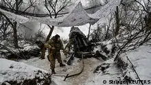 14.01.2024**Ukrainian servicemen fire a M777 howitzer toward Russian troops at a position near a front line, amid Russia's attack on Ukraine, in Zaporizhzhia region, Ukraine January 14, 2024. REUTERS/Stringer
IMAGE PACKAGE: Along the frozen frontlines in Ukraine