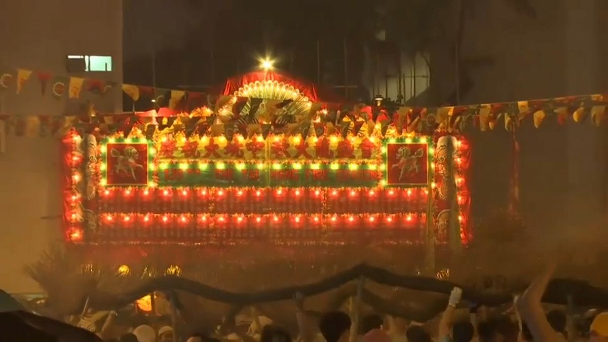 Fire dragon dances through streets of Hong Kong