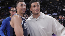  Dante Exum #0 and Josh Green #8 of the Dallas Mavericks.