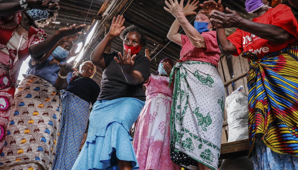 A group of women gathered together in Nairobi, Kenya, Sept. 16, 2021. (AP)