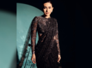 Karisma Kapoor’s sheer net black sari is your ultimate cocktail night inspiration