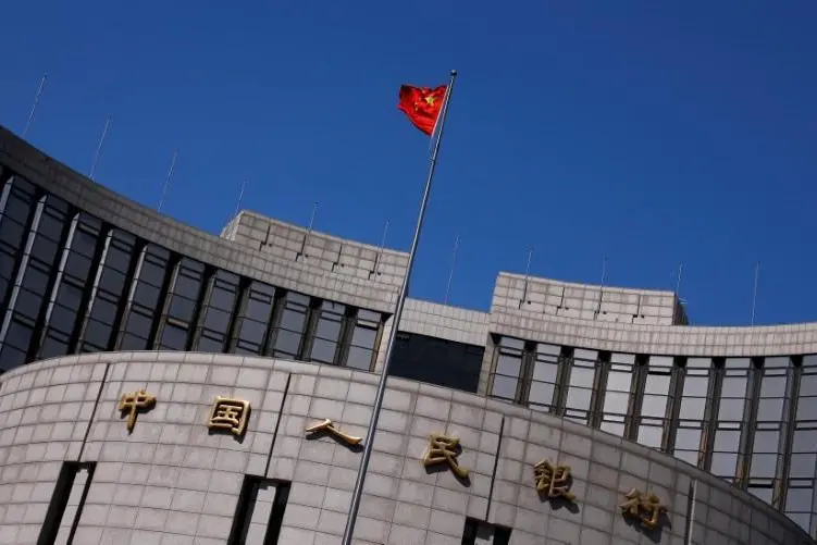 China central bank adviser calls for greater stimulus, inflation goal