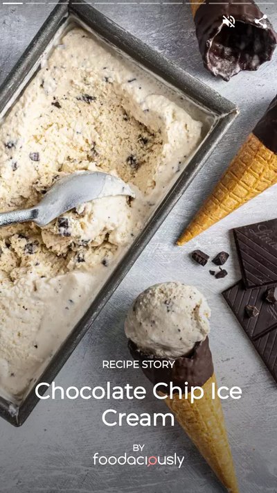 Chocolate chip ice cream and ice cream cones on a counter