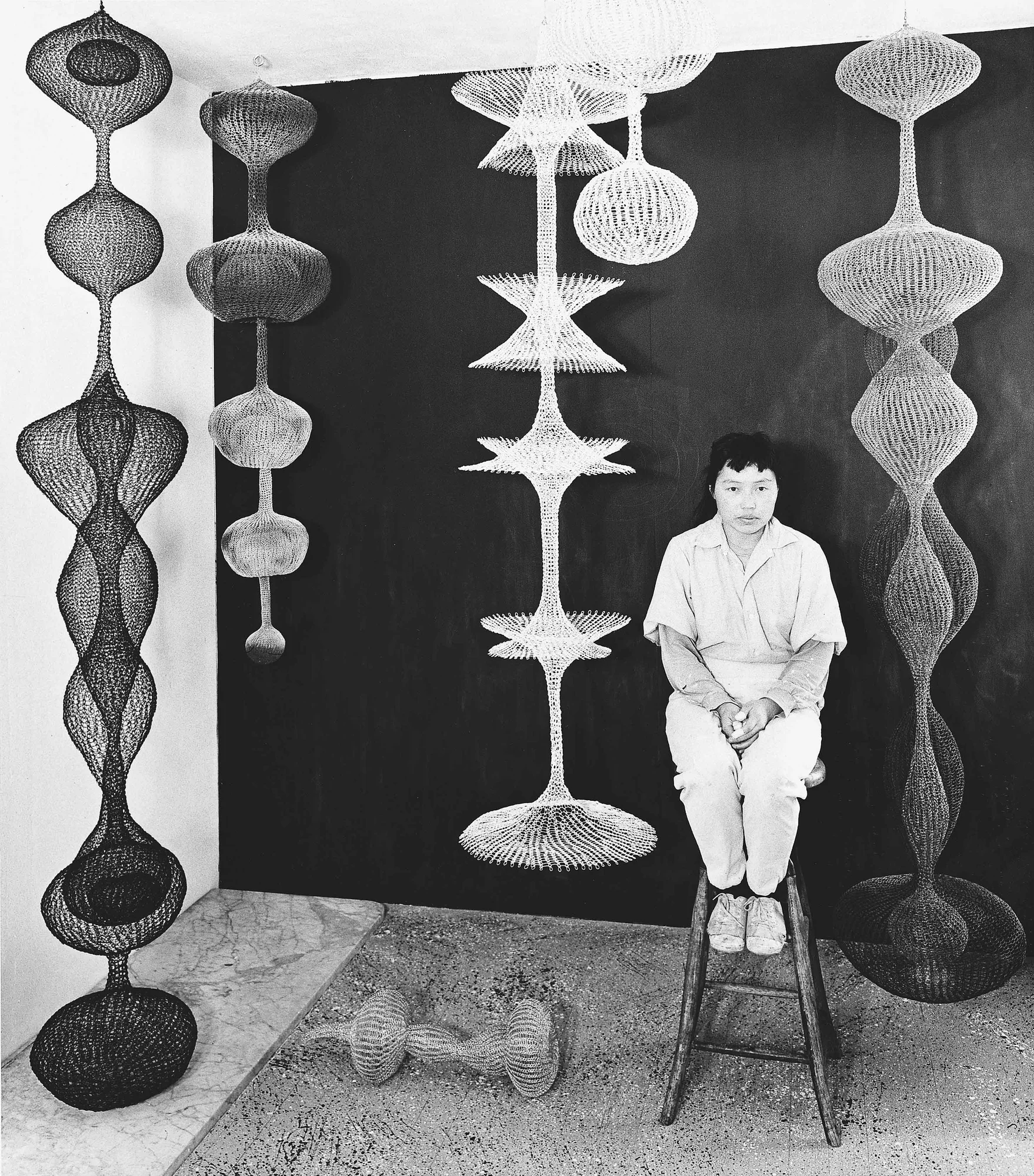 Picture of Ruth Asawa in her studio circa 1956