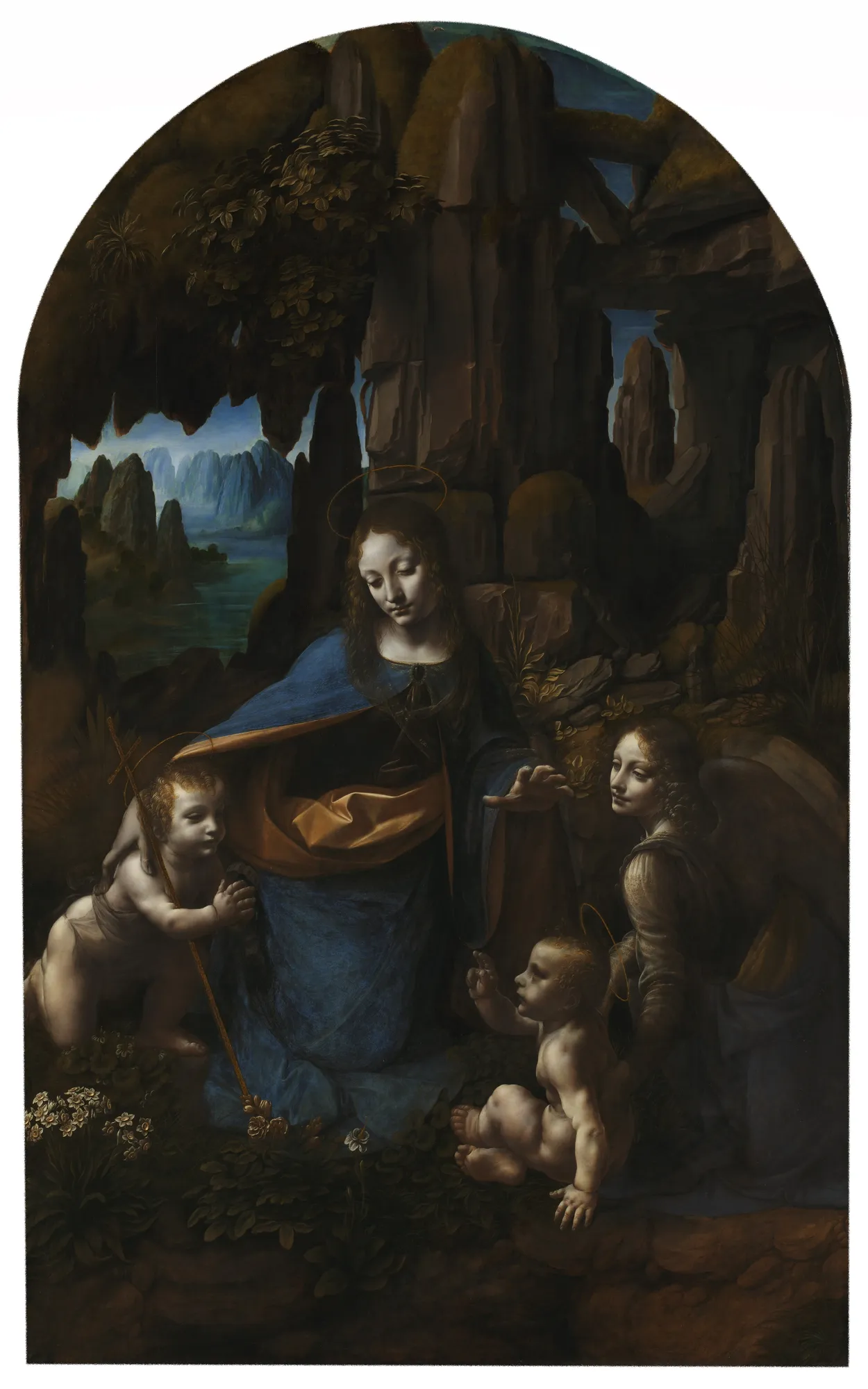 A painting depicting the Virgin Mary seated amidst rocky terrain, accompanied by the Child Jesus and two angels, set against a serene landscape.