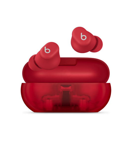 Beats Solo Buds Ohreinsätze in Transparent-Rot, die über dem kompakten Tragecase schweben.