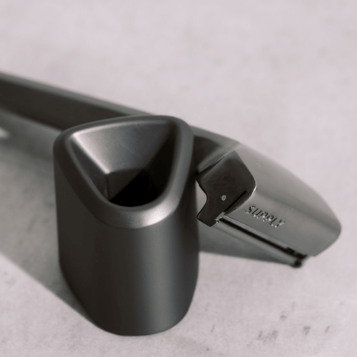 the supply single edge blade razor beside the supply razor stand