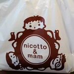 Doughnut Cafe nicotto & mam Karasuma Oike Ten - お店のロゴ入りのビニール袋