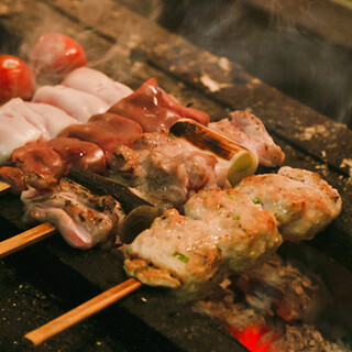 Each piece is carefully skewered and grilled over binchotan charcoal.