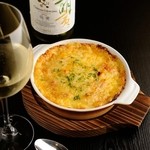 扇 - 酢飯を使用したオリジナリティあふれる味わいが魅力『ドリア』