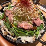 坐もつ焼き いしん - 料理写真:牛もつ鉄板焼きお味は２種類　濃厚醤油と辛味噌