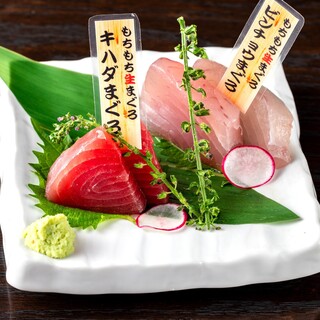 A comparison of two types of sashimi: chewy raw yellowfin tuna and raw albacore tuna