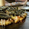 Okonomiyaki Nakacho - お好み焼き"中長"（¥1,155税込）
                名物女将の推し、醤油だれと一味マヨ、味付け海苔どっさりの、個性ある素晴らしい一枚♪ｳﾏ━ (●>艸<) ━ｽ!!!