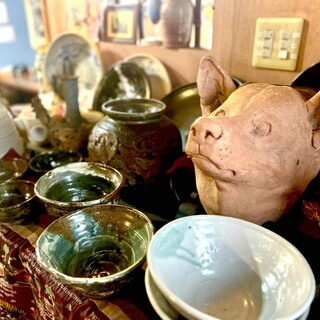 Enjoy special Chinese cuisine served on handmade pottery by the owner, a sculpting potter.