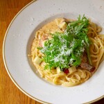 Rich shrimp cream pasta with plump shrimp and colorful vegetables