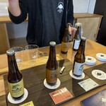 Michikusa - 入口の横に併設されていたクラフトビールコーナー。盆栽のビールでした。真ん中の物を頂きました。