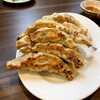 華園 - 料理写真:日本一旨し（オレ比）なギョーザは健在。餡は肉リッチ、自家製だという皮がもつキレの佳さよ。