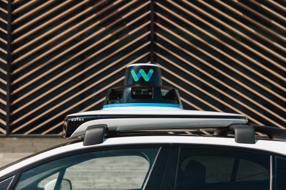 top of Waymo car, showing equipment on roof