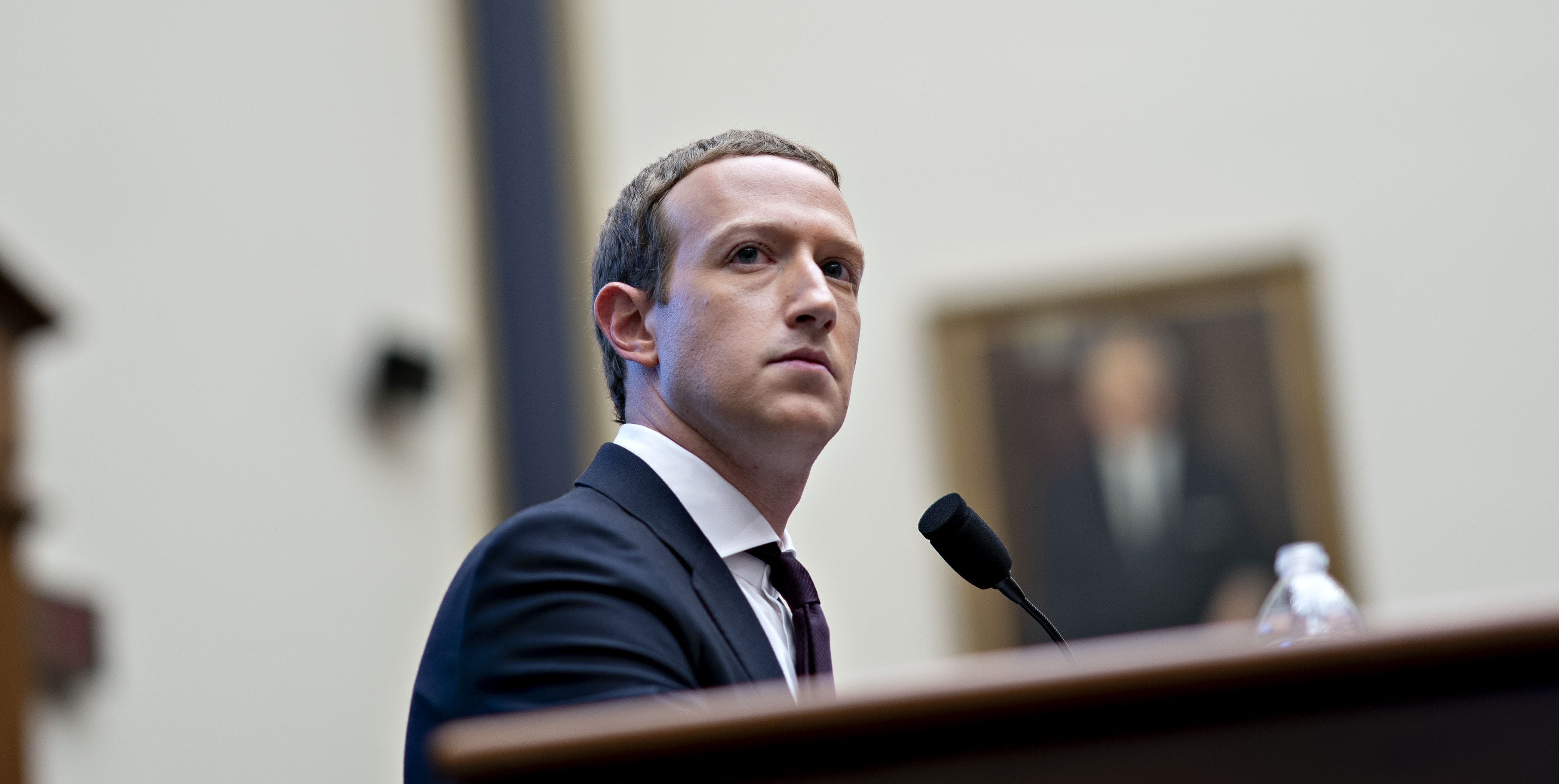 Mark Zuckerberg, chief executive officer and founder of Facebook Inc., listens during a House Financial Services Committee hearing in Washington, D.C., U.S., on Wednesday, Oct. 23, 2019. Zuckerberg struggled to convince Congress of the merits of the company's plans for a cryptocurrency in light of all the other challenges the company has failed to solve. Photographer: Andrew Harrer/Bloomberg via Getty Images