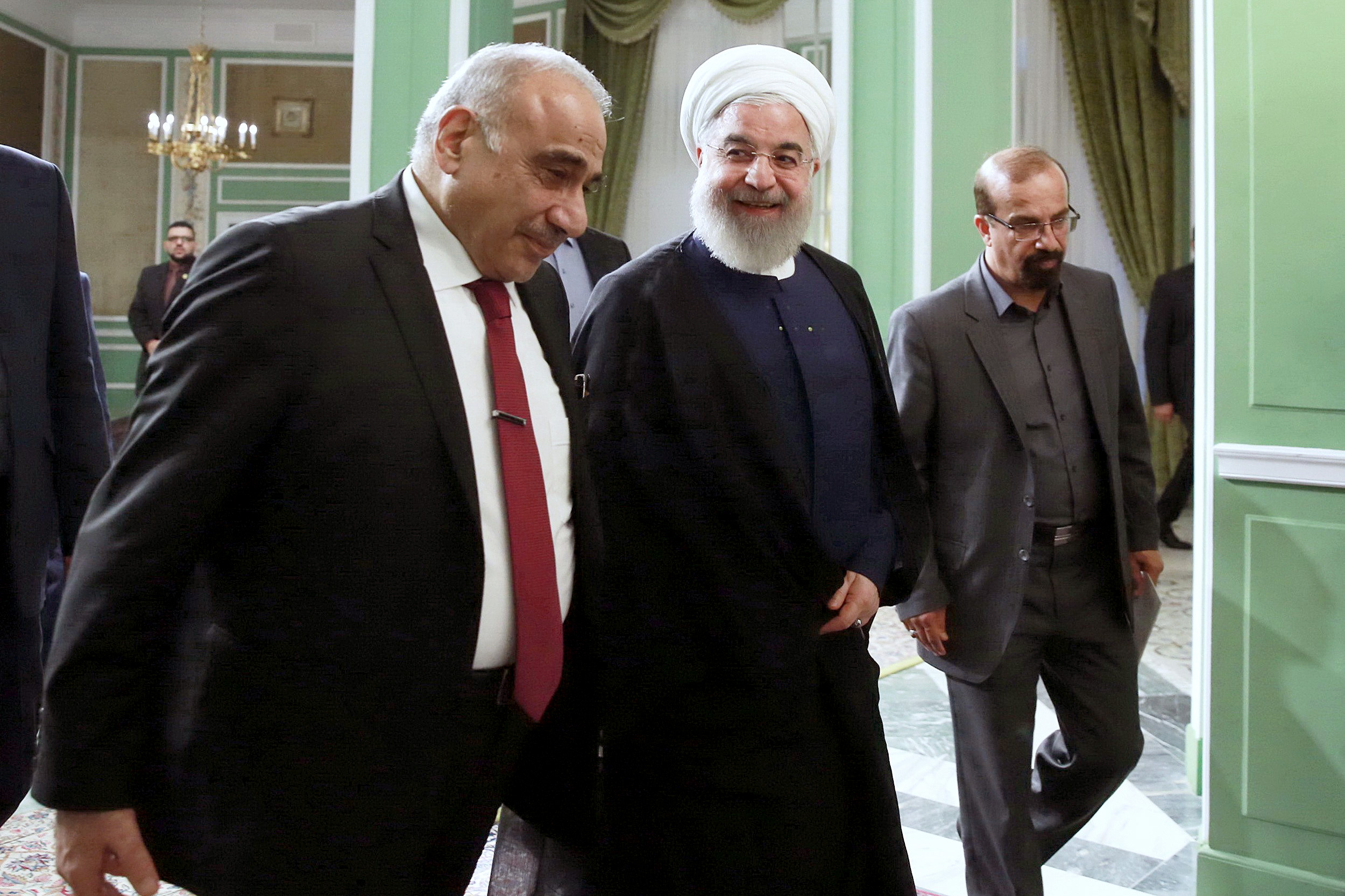 TEHRAN, IRAN - JULY 22: Iraqi Prime Minister Adil Abdul-Mahdi (L) meets with Iranian President Hassan Rouhani (C) as part of his visit in Tehran, Iran on July 22, 2019. (Photo by Iranian Presidency/Handout/Anadolu Agency via Getty Images)