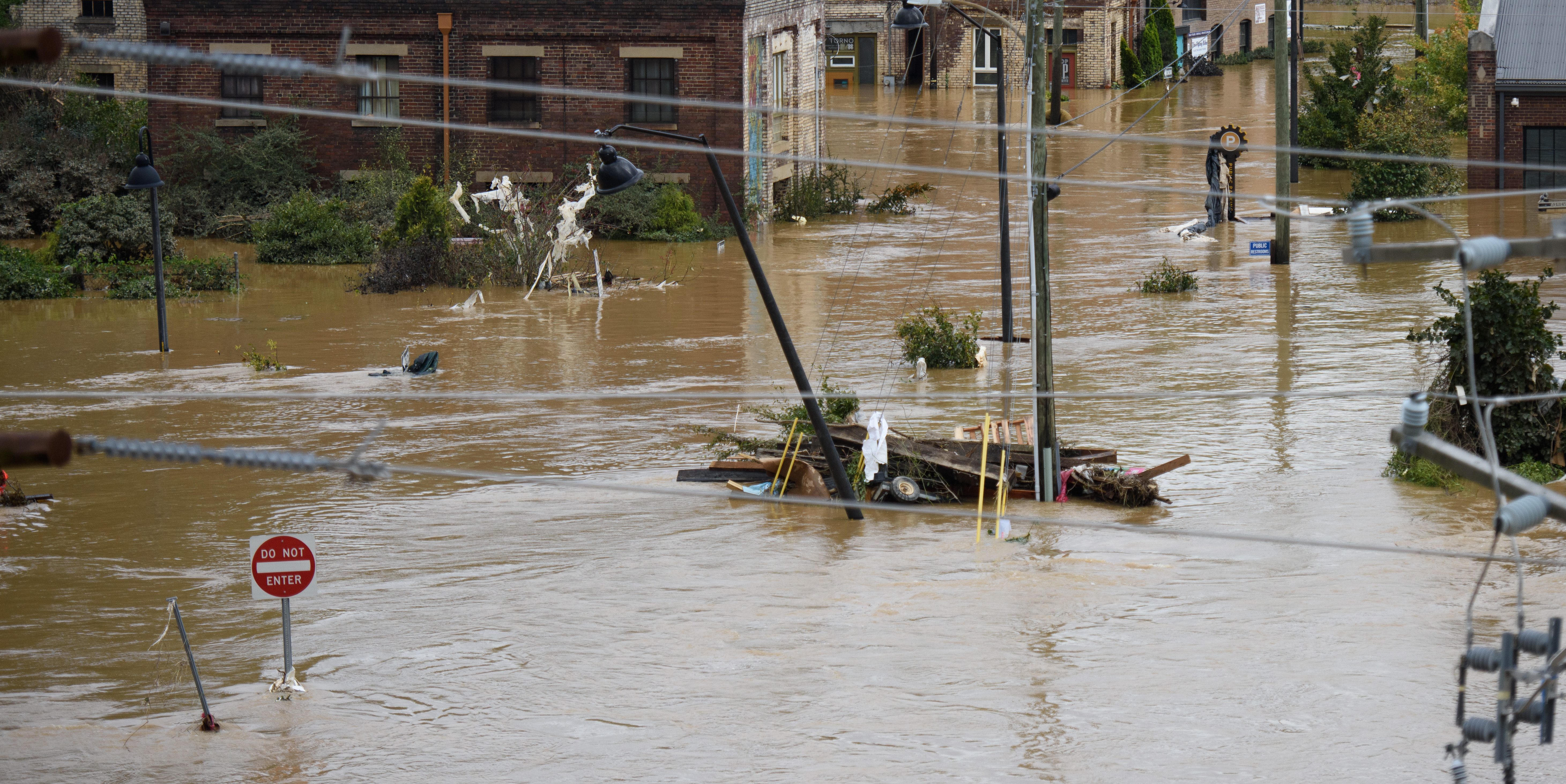 ASHEVILLE, NORTH CAROLINA - SEPTEMBER 28: Heavy rains from hurricane Helene caused record flooding and damage  on September 28, 2024 in Asheville, North Carolina. Hurricane Helene made landfall in Florida's Big Bend on Thursday night with winds up to 140 mph and storm surges that killed at least 42 people in several states. (Photo by Melissa Sue Gerrits/Getty Images)