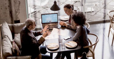 people negotiating at a business table