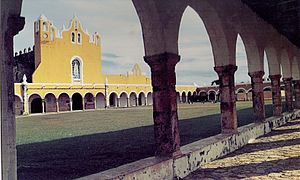 Main arcade of convent and church entrance