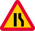 Road narrows on right sides