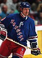 Image 1 Wayne Gretzky Photo credit: Håkan Dahlström Ice hockey player Wayne Gretzky, as a member of the New York Rangers of the National Hockey League (NHL) in 1997. Gretzky, nicknamed "The Great One", is widely considered the best hockey player of all time. Upon his retirement in 1999, he held forty regular-season records, fifteen playoff records, and six All-Star records. He is the only NHL player to total over 200 points in one season—a feat he accomplished four times. In addition, he tallied over 100 points in 15 NHL seasons, 13 of them consecutively. He is the only player to have his number (99) officially retired by the NHL for all teams. More selected pictures