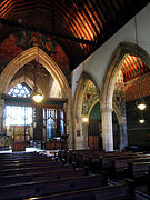 Richly decorated Arts and Crafts interior of All Saints', Cambridge.