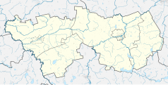 Mapa konturowa powiatu lidzbarskiego, po lewej znajduje się punkt z opisem „Karkajmy”