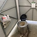 Australian 'long drop' pit latrine with ventilation pipe at a campsite in the Great Otway National Park